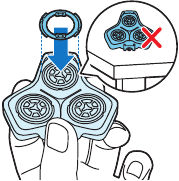 Replacing the shaving heads Step 7