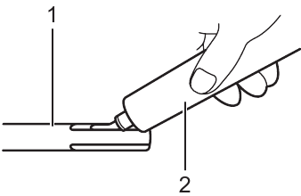 Installing or removing the bit - Step 1